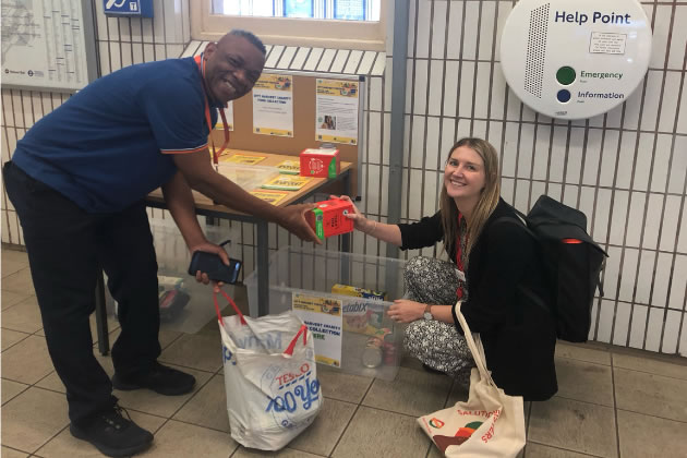 David Cranstoun takes donations at the new collection point 