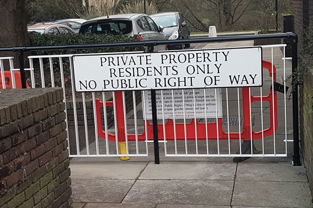 Gates at Brentford Dock seen by residents. Image: Jim Storrar