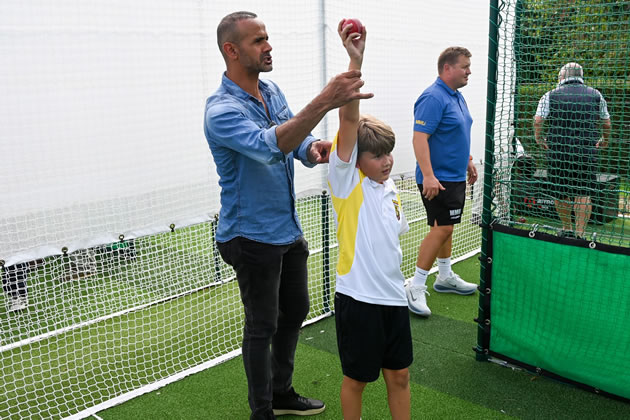 Owais Shah coaching a young cricketer in the new nets 