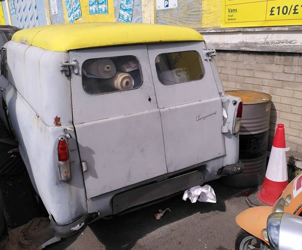 Old van at car wash