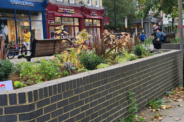 The newly planted flowerbeds 