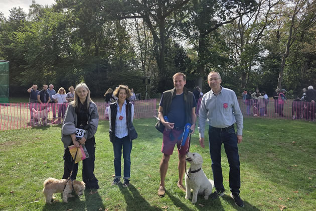Andy Slaughter with the two winners of the handsomest dog category age 3-4