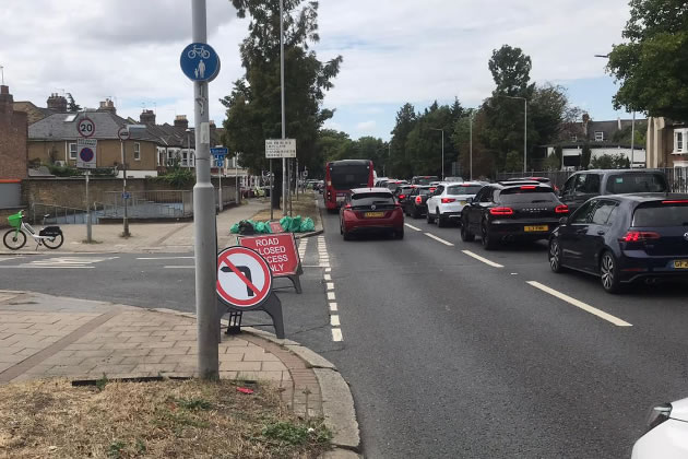 Traffic queueing on the approach to Hogarth Roundabout 