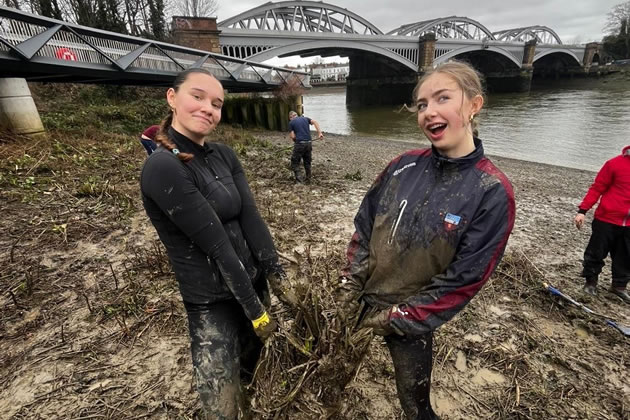 Club members help clean up the slipway.