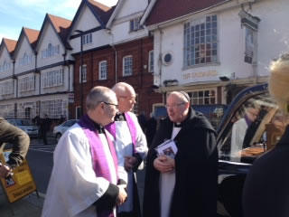 The hearse prepares to leave 