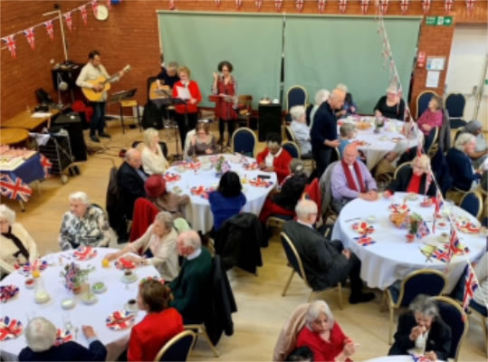 Playing at the Seniors' Coronation Tea Party