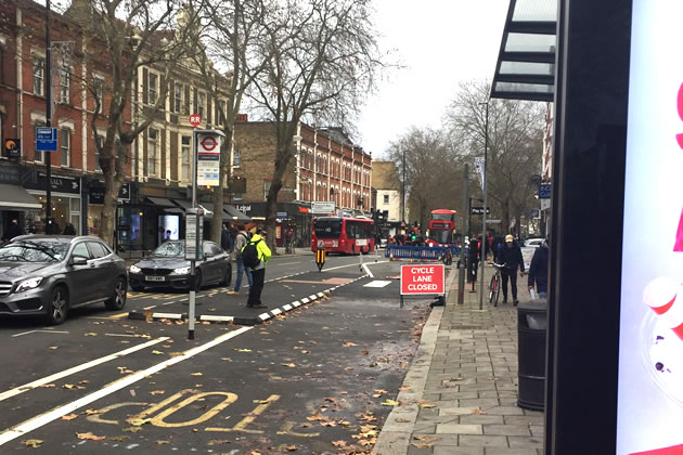 Bus shelters are some distance from the stop islands 