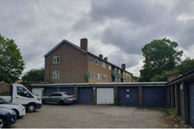 The garages to be demolished on Beaconsfield Close viewed from Havard Lane 