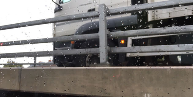 Lorry appears to have become wedged between barriers. Picture: Marcus Fennell 