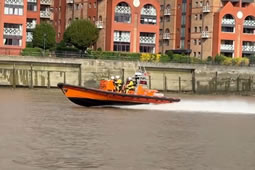 RNLI Lifeboat Crew Departs from Chiswick Pier Station