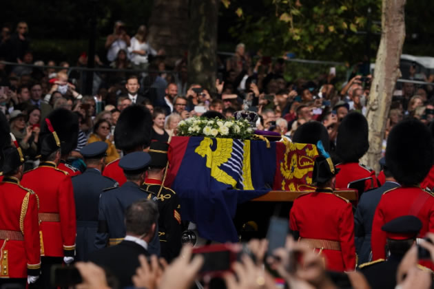 Guardsmen accompanying the Queen's coffin