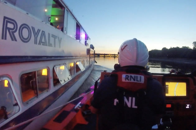 Lifeboat alongside the cruiser using chart plotter