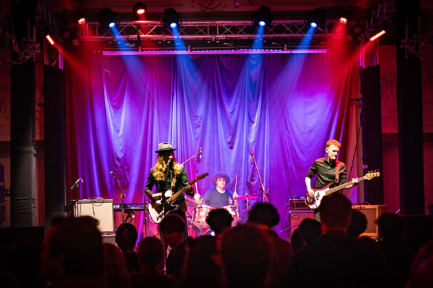 Henry and Zion performing with Uncle Dynamite