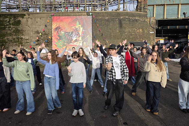 Chiswick School students perform at the unveiling