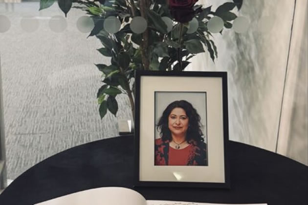 A photo of the councillor next to the Condolence Book at Perceval House. Picture: Ealing Council