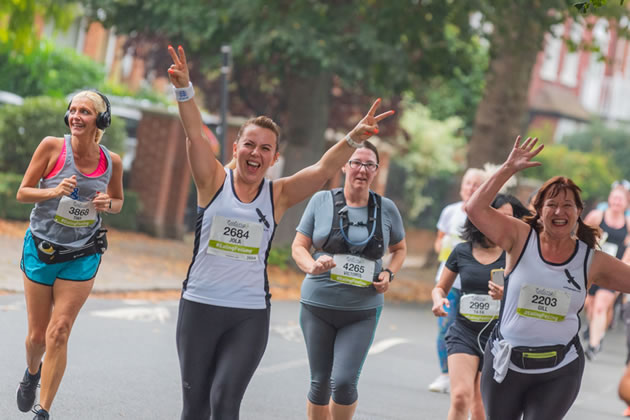 Ealing Half Marathon runners celebrate finishing