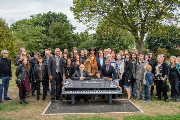 John Wood and Nicky Hopkins's wife Moira (centre) at the unveiling of the bench