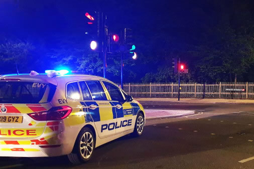 police car at traffic lights