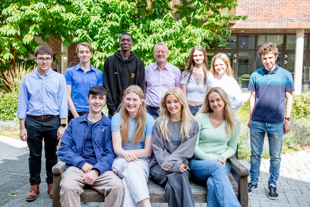 St Benedict's students with the Head after collecting their results