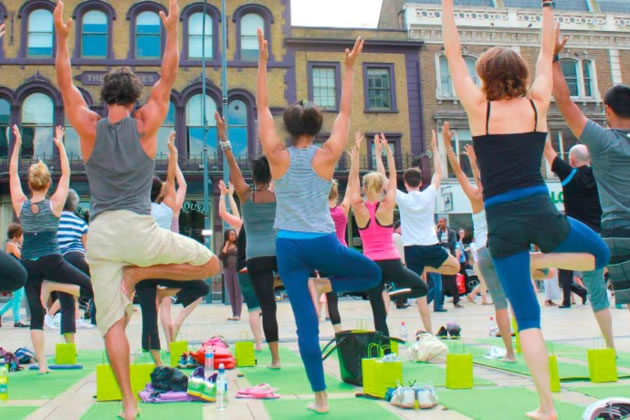 Yoga in Lyric Square during a previous festival