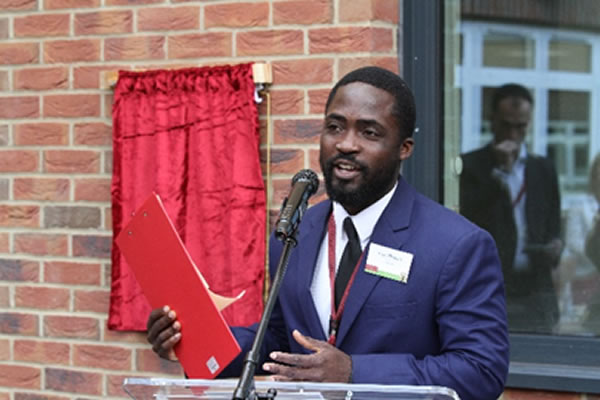 Alex Shoderu, School Chaplain speaking at the unveiling