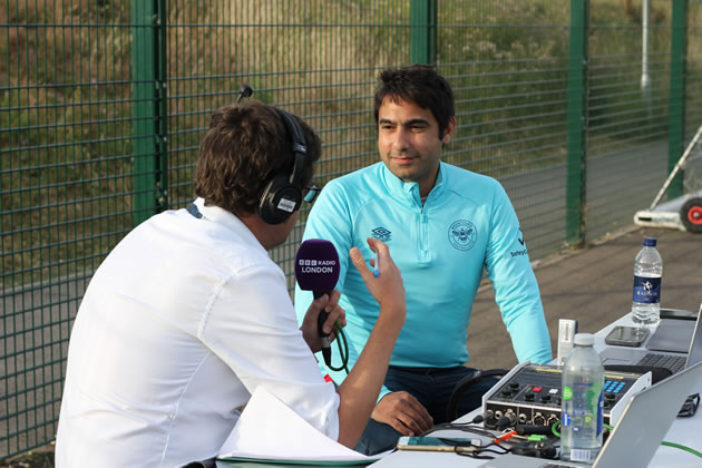 Cllr Shaheen does a radio interview during the session 