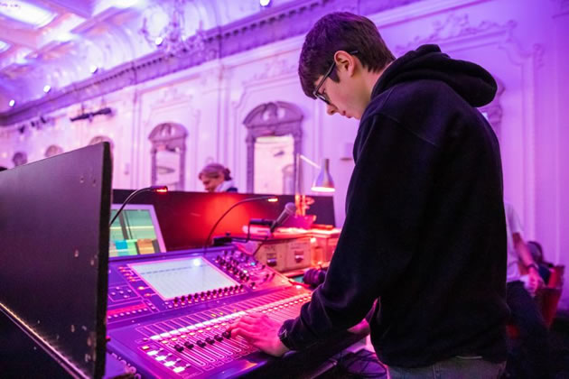 A Moat pupil learning how to be a sound technician