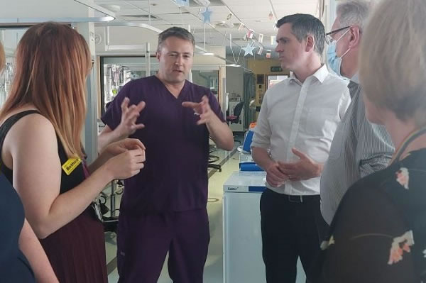 Council leader Simon Hogg (second right) visits St George's Hospital