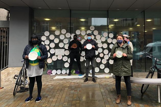 Labour councillors protesting against council's school meals provision 